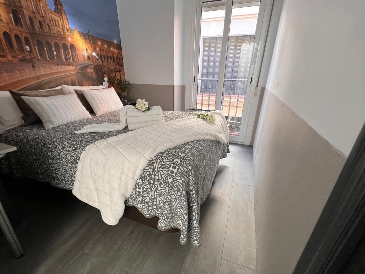 Hostal Paco'S Sewilla Zewnętrze zdjęcie A bedroom in the hotel