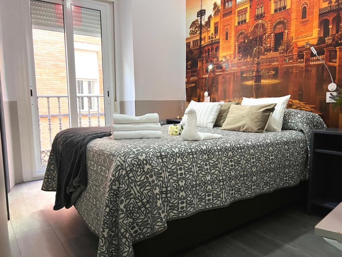 Hostal Paco'S Sewilla Zewnętrze zdjęcie A bedroom in a hotel